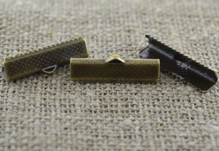 17129 Końcówka wstążki w kolorze brązu 25*6mm 4szt