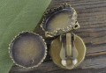 10449 Ozdobna baza klipsa w kolorze brązu na kaboszon 15mm