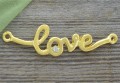 21215 Element ozdobny napis love z cyrkonią w kolorze złota
