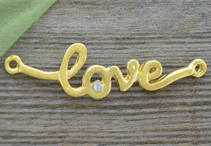 21215 Element ozdobny napis love z cyrkonią w kolorze złota
