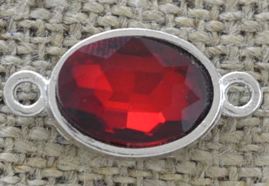 [312183] Element ozdobny łącznik cyrkonią w kolorze czerwonym