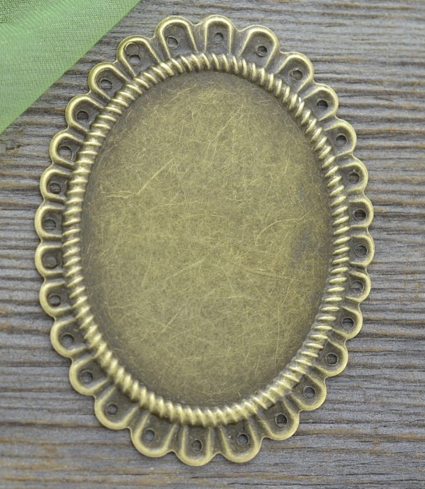 101122 Ozdobna baza medalionu w kolorze brązu na kaboszon 40x30mm