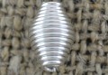 312133 Element ozdobny sprężynka w kolorze srebrnym 10szt