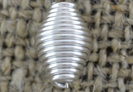 312133 Element ozdobny sprężynka w kolorze srebrnym 10szt