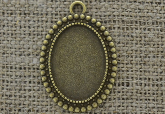 {101201} Ozdobna baza medalionu w kolorze brązu na kaboszon 25*18mm